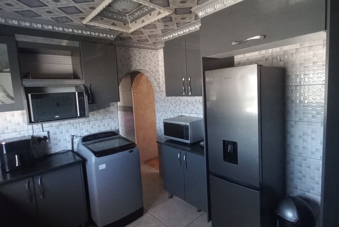 Move-In Ready Gem! Modern Finishes & Maximum Security